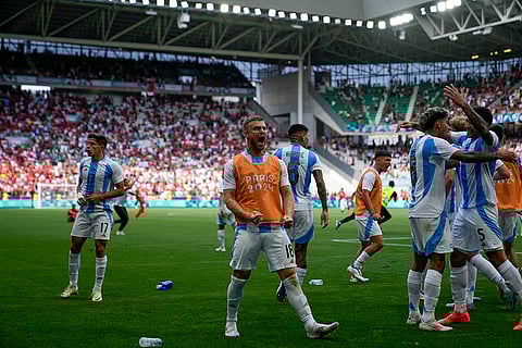 Argentina's players celebrate their side's second goal